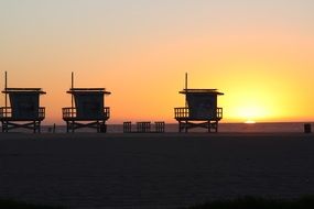 dark silhouettes on the beach in los angeles