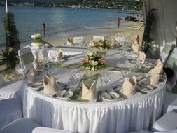 tables for the wedding on the coast in Grand Anse