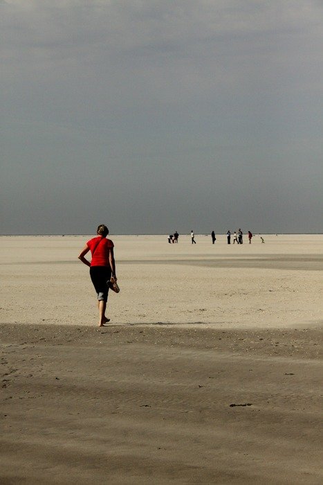 man stands on the beach