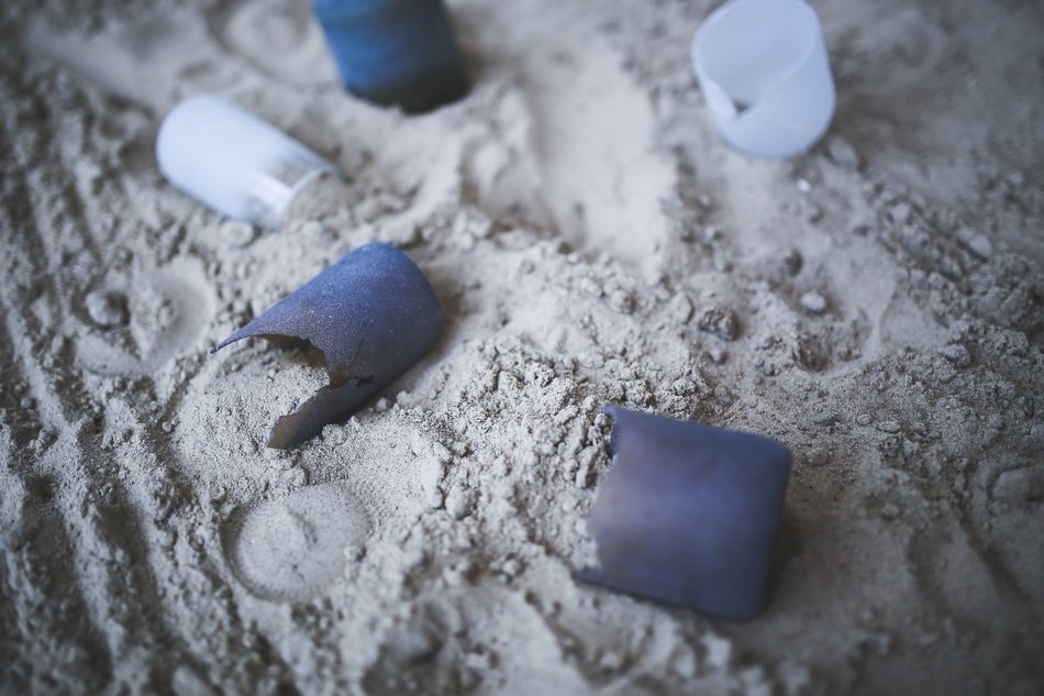 broken bottles on a sand