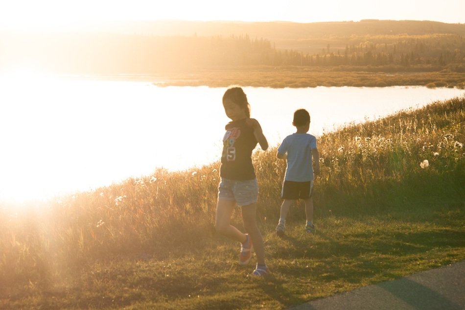 Happy children by the lake in Canada