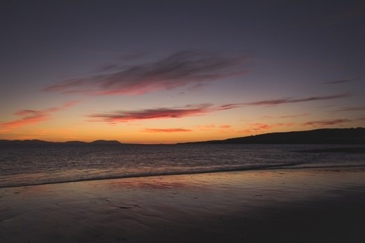 Sunset on the beach of the ocean