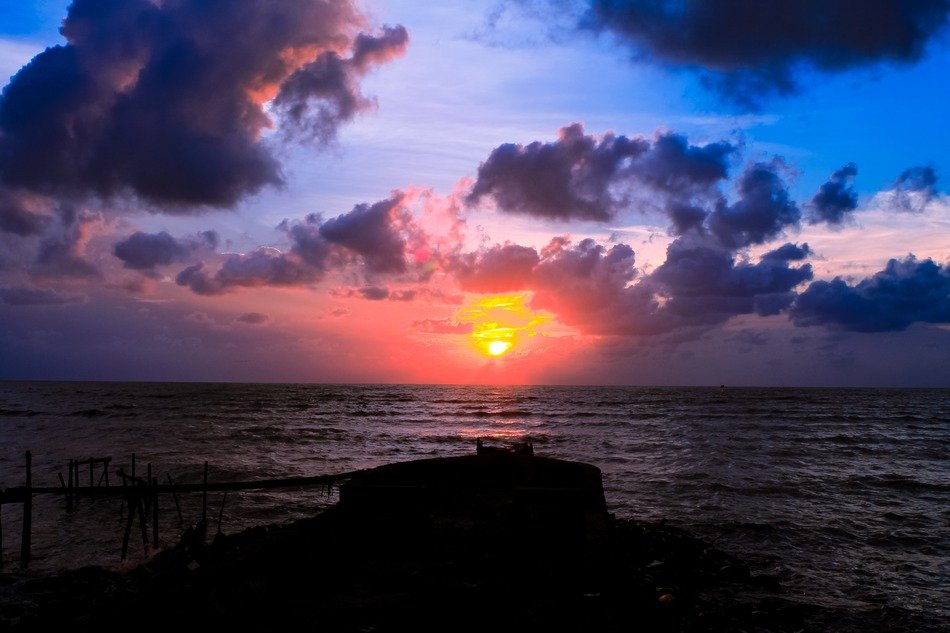 sunset in the clouds over the sea