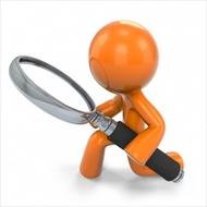 figure of a man with a magnifying glass drawing