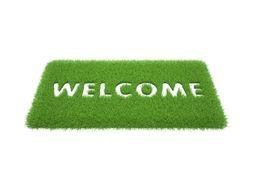 Welcome, white letters on green lawn, render