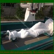 lying white woman statue