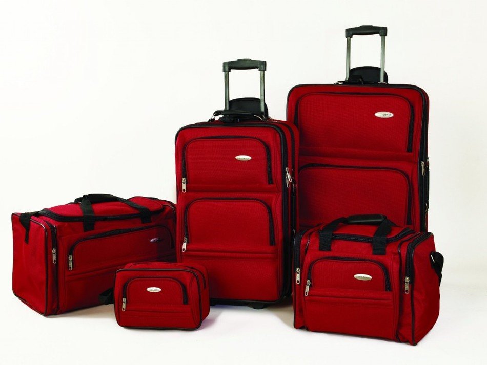 photo of burgundy suitcase set