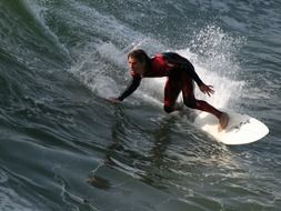 surfer rides the waves