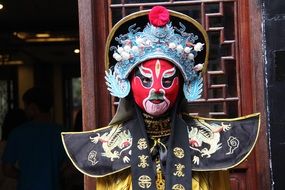 colorful mask as an element of a traditional costume in china