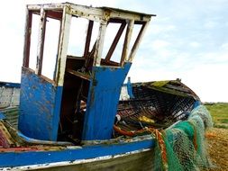 fishing trawler on the shore