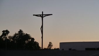 silhouette of the crucifix at sunset in portugal