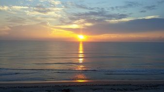 sunrise above the ocean water