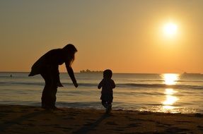mother daughter sunset