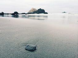stones on the sandy coast