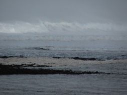 stormy ocean water on the beach