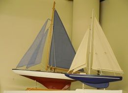 models of two sailboats