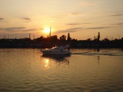 gold sunset boat