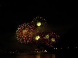 fireworks reflected in water