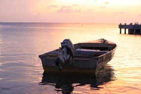 empty boat tied with rope