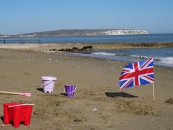 toys and english flag on shanklin beach