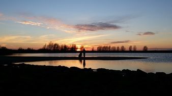 Sunset on the silhouettes in the evening