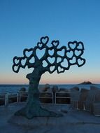 sea hart sculpture at colorful sunset background