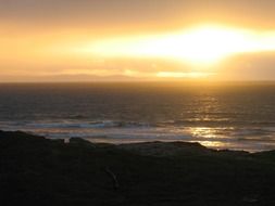 orange light of the sun at sunset