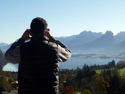 tourist in the alps on a sunny day