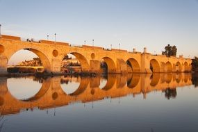 ROMAN BRIDGE OVER THE GUADIANA RIVER at dusk, spain, MÃ©rida