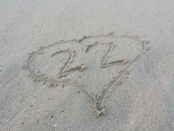 22 lettering and a heart on the sand at the beach