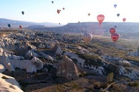 balloons fly over the valley