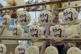 new yearâs eve, balls painted with cats on market display