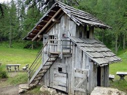 wooden structures on the playground in the forest