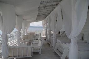 white bar near the sea