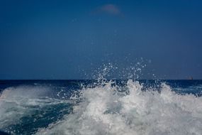 blue-green color water splash flow drop of water ocean