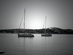 sailing boats on water at coastline, spain, mallorca