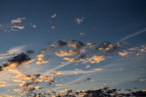 fluffy clouds at sunset