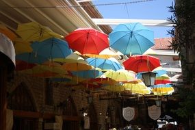 bright umbrellas as the decor of a city street