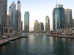 skyscrapers at water, dubai