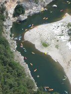 view from the top of canoeists, canoeing in river