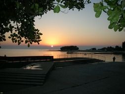 sunset on the waterfront of the city of Umag