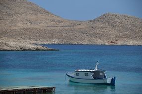 chalki bay boat greece island sea mountain view