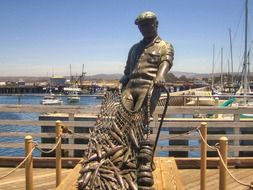 fisherman statue in harbor, usa, california, San Francisco