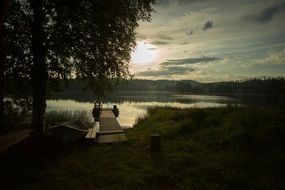 pier at lake romantic sunset scene