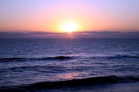 sunrise on the ocean horizon