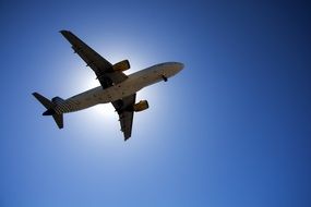 Airplane sunny sky backlight blue