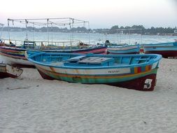 boats on the shore of a fishing village in Tunisia