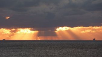 sun rays through the clouds over the north sea