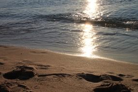 seascape of waving water on the beach