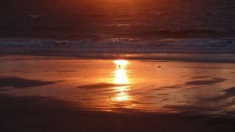 romantic sunset over the north sea coast